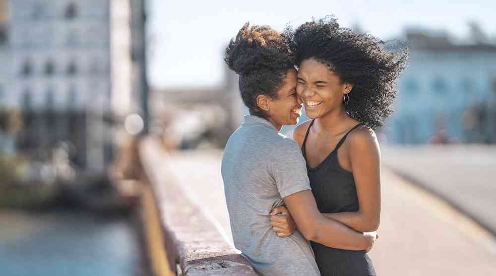 When It Isn't Just Friendship: Signs A Woman Is Attracted To